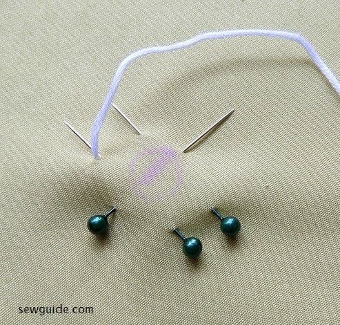 start by placing pins and then wrapping thread over them