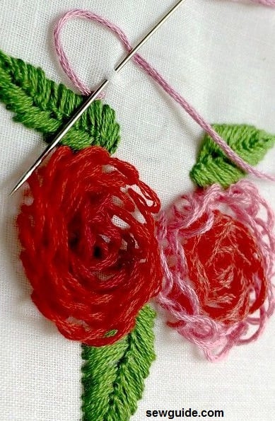 Make simple loops with embroidery flowers to make the 3 d effect pop