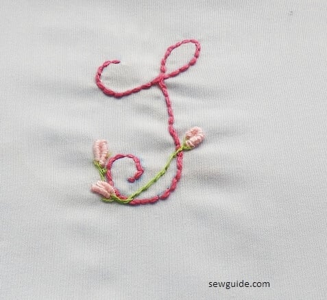 Letters embroidered with back stitches