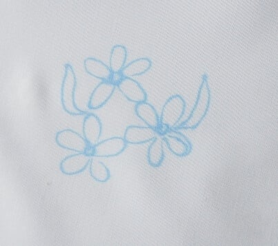 Draw flower shapes on fabric