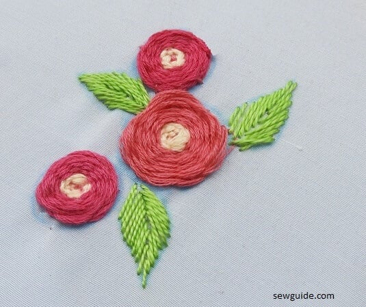 Woven roses and fly stitch leaves