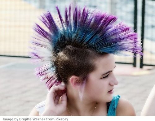 a girl with a punk hairstyle