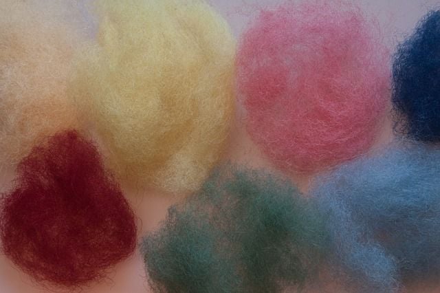 felt material made fy felting fibers with water, soap and pressure