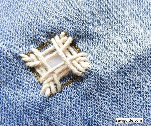 fix hole in jeans with embroidery