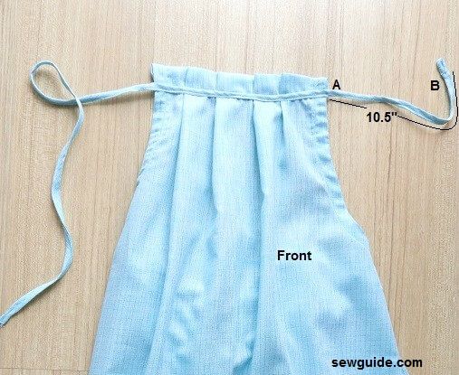 Sew the fabric tube on the front of the halterneck top