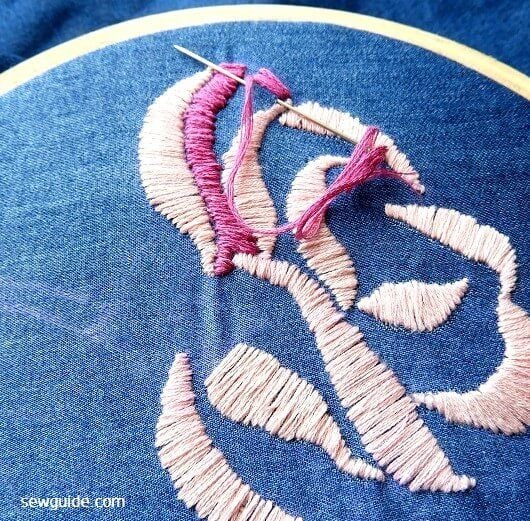 Sew satin stitch to fill the embroidery designs