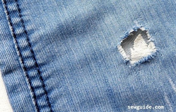 fix hole in jeans with fabric 