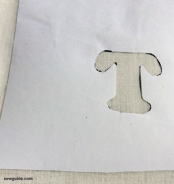 use the cut out as a stencil for the monogram