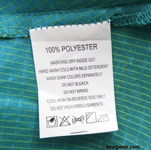 fabric care label on a polyester fabric clothing