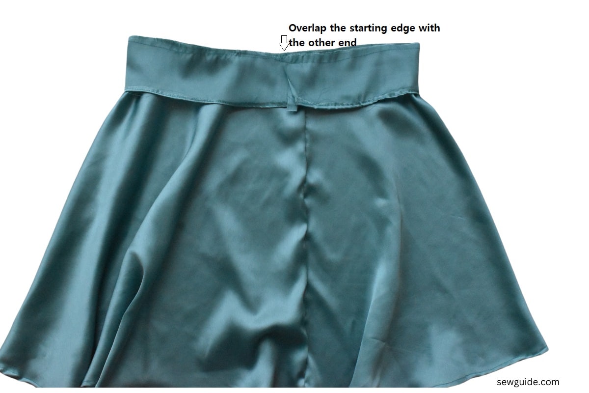 overlap the waistband edges