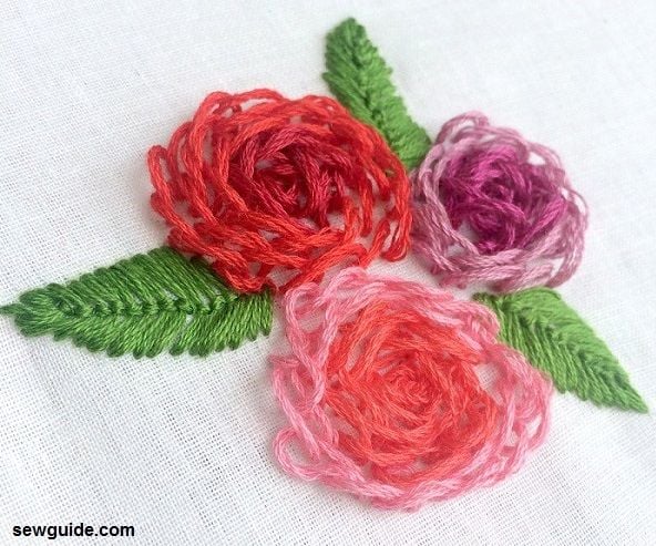 Loop stitches made around a point to make 3d rose flowers