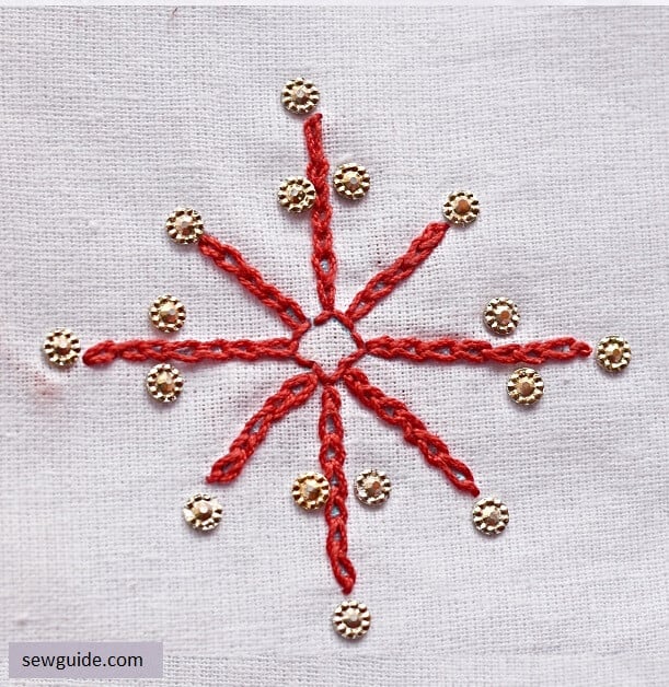 make snowflakes with embroidery stitches