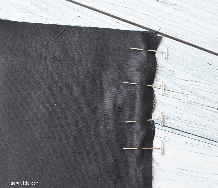 using pins in sewing to hold fabric pieces together